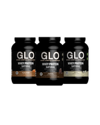 Three bottles of GLO whey protein on a white background